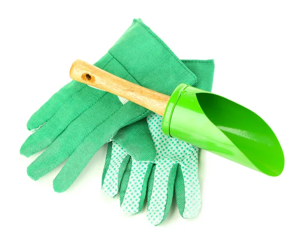 Small gardening shovel and gloves isolated on white — Stock Photo, Image