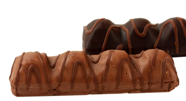 Dvě lahodné čokoládové tyčinky izolovaných na bílém — Stock fotografie