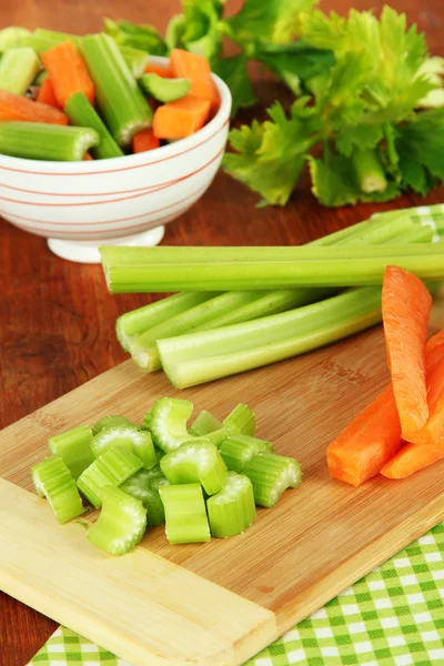 Fresh green celery with vegetables on table close-up — Stock Photo, Image