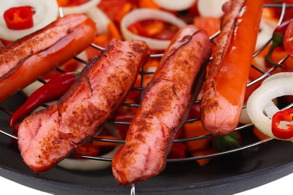 Delicious sausages in wok close-up background — Stock Photo, Image