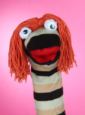 pembe bir arka plan üzerinde şirin çorap kukla