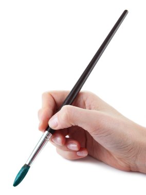 el ile üzerine beyaz izole yeşil boya fırçası tutarak