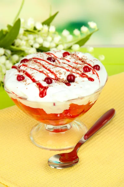 Tasty jelly in bowl on table on light background — Stock Photo, Image