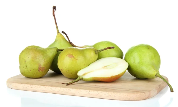 Pears on wooden cutting board, isolated on white — Stock Photo, Image