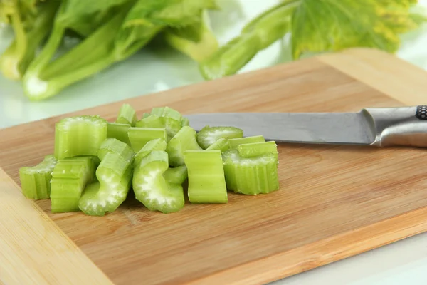 Fresh green celery on cutting board close-up — Stock Photo, Image
