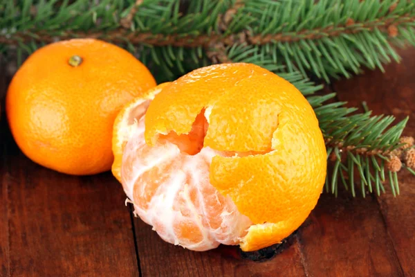 Tasty mandarines on wooden background — Stock Photo, Image