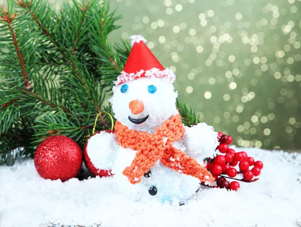 Beautiful snowman and Christmas decor, on bright background — Stock Photo, Image
