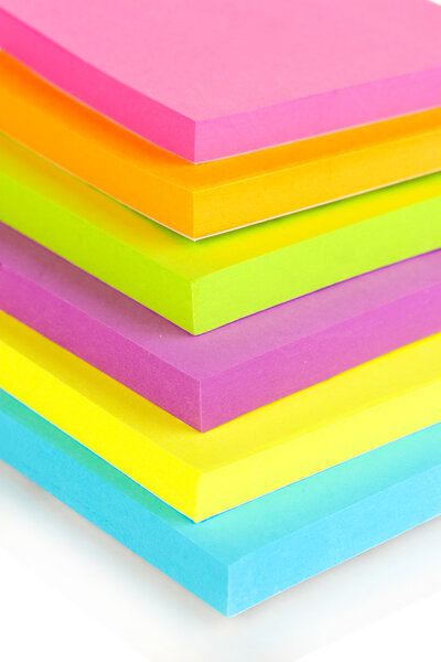Stack of colorful Sticky Notes isolated on white