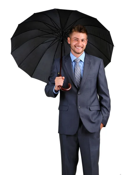 Podnikatel s deštníkem. na šedém pozadí — Stock fotografie