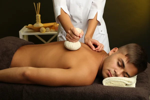 Young man having back massage close up — Stock Photo, Image