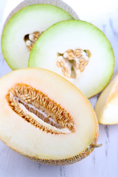 Ripe melons on wooden table close-up — Stock Photo, Image