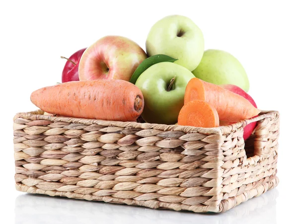 Sweet apples and carrots in basket isolated on white — Stockfoto