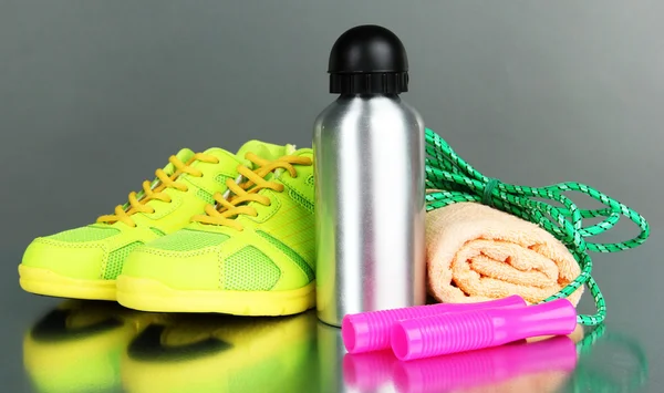 Different tools for sport on grey background — Stock Photo, Image
