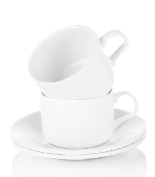 Белые чашки, изолированные на белый — стоковое фото