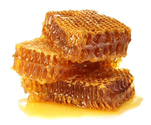 Zoete honingraat met honing, geïsoleerd op wit Rechtenvrije Stockafbeeldingen
