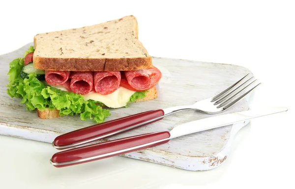 Tasty sandwich with salami sausage and vegetables on cutting board, isolated on white — Stock Photo, Image