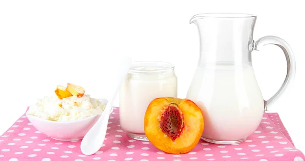Fresh dairy products with peaches isolated on white — Stock Photo, Image