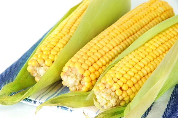 Crude corns on napkin isolated on white — Stock Photo, Image
