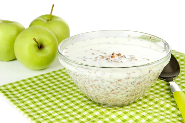 Buckwheat porridge with milk on napkin isolated on white — Stock Photo, Image