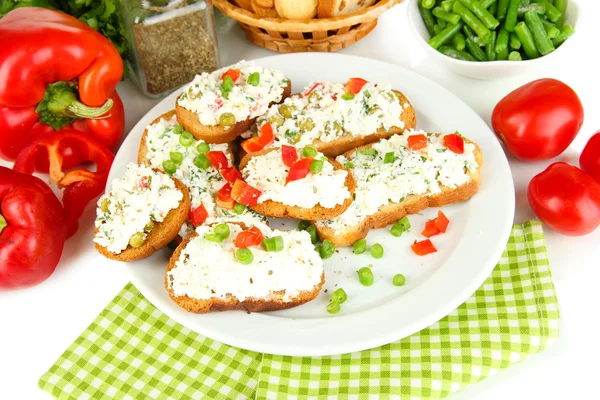 Sandwiches with cottage cheese and greens on plate isolated on white — Stock Photo, Image