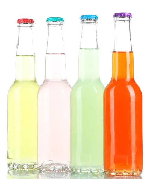 Drinks in glass bottles isolated on white Royalty Free Stock Images