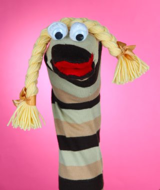 pembe bir arka plan üzerinde şirin çorap kukla