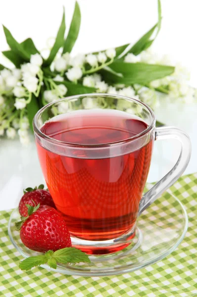 Delicious strawberry tea on table on white background — Stock Photo, Image