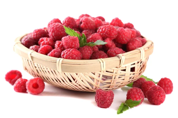 Ripe sweet raspberries in basket, isolated on white — Stock Photo, Image