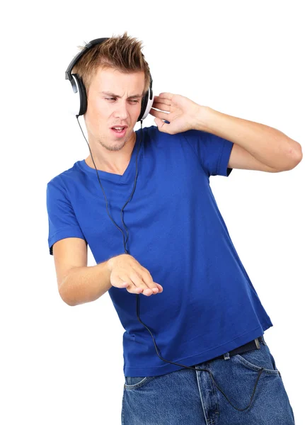 Handsome young man listening to music isolated on white — Stock Photo, Image