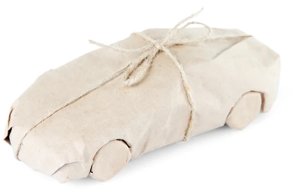 Car wrapped in brown kraft paper, isolated on white — Stock Photo, Image