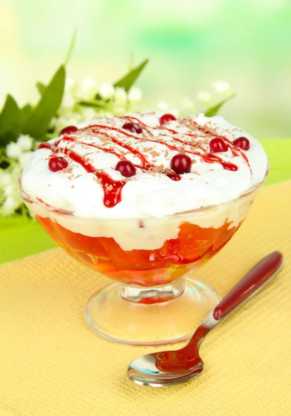 Tasty jelly in bowl on table on light background — Stock Photo, Image