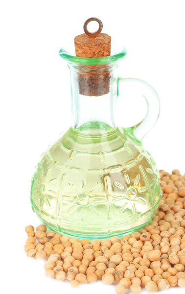 Soy beans and oil isolated on white