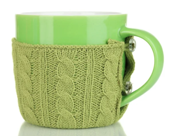 Cup with knitted thing on it isolated on white — Stock Photo, Image