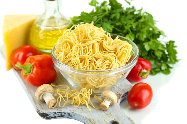 Pasta with oil, cheese and vegetables isolated on white — Stock Photo, Image