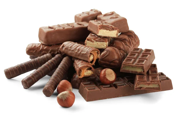 Deliciosas barras de chocolate con nueces aisladas en blanco —  Fotos de Stock