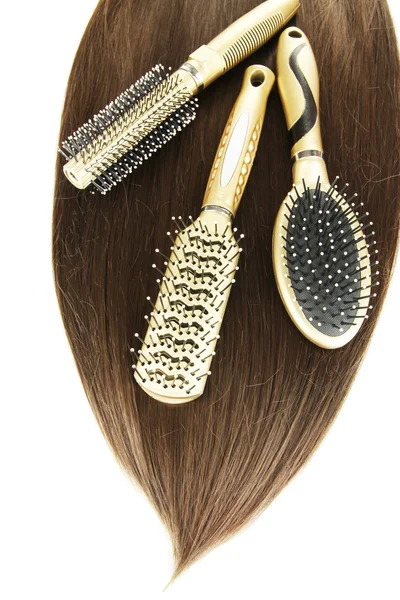 Glänsande brunt hår med vaxkakor isolerad på vit — Stockfoto