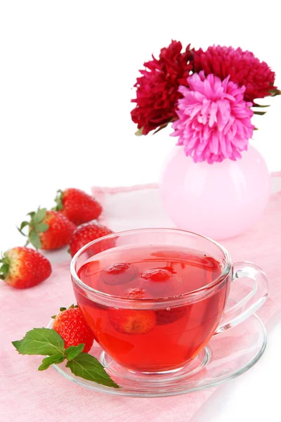 Delicious strawberry tea on table on white background — Stock Photo, Image