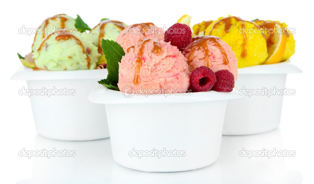 Tasty ice cream scoops in bowls, isolated on white