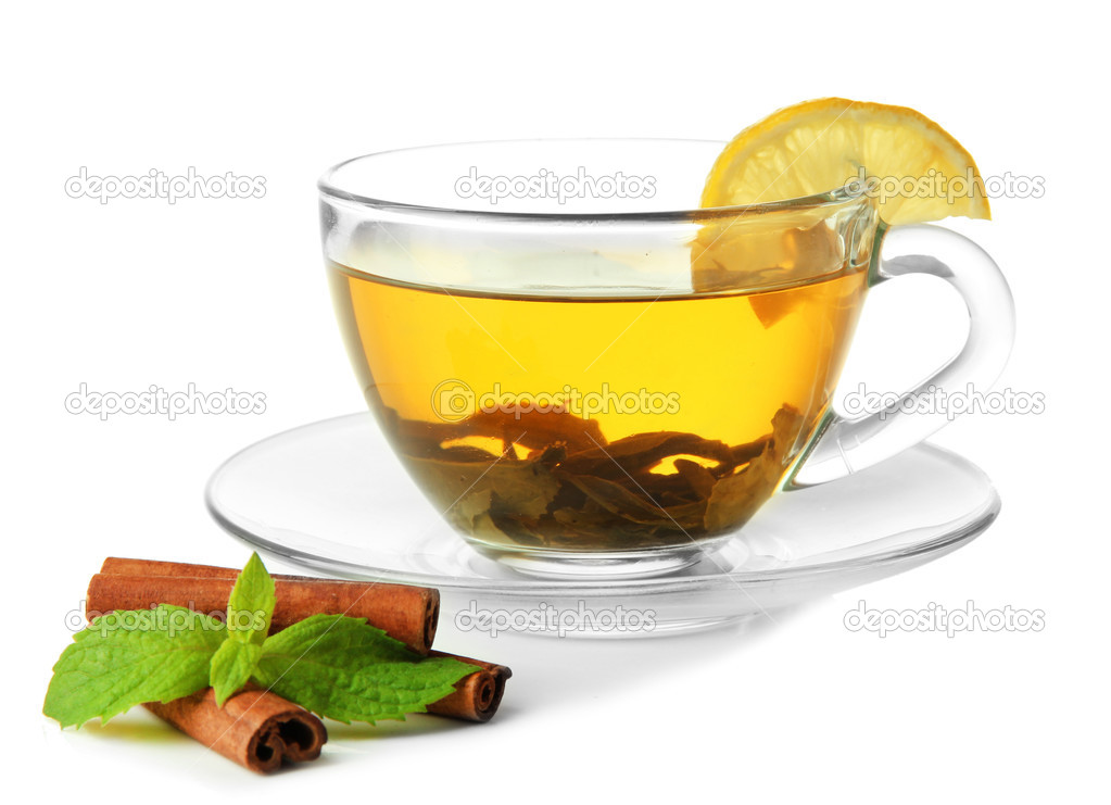 Transparent cup of green tea with cinnamon and mint isolated on white