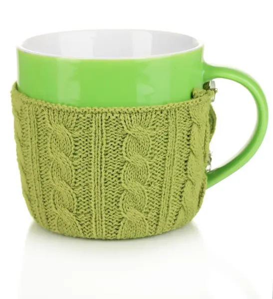 Cup with knitted thing on it isolated on white — Stock Photo, Image