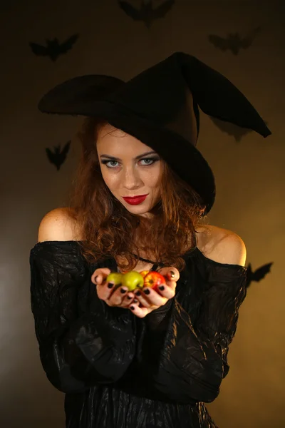 Halloween witch on dark background — Stock Photo, Image