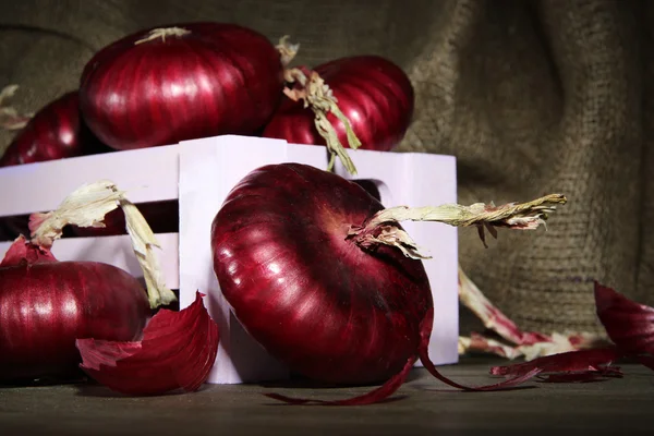 Fresh red onions in cellar — Stock Photo, Image