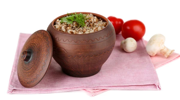 Buckwheat in pot with vegetables isolated on white — Stock Photo, Image