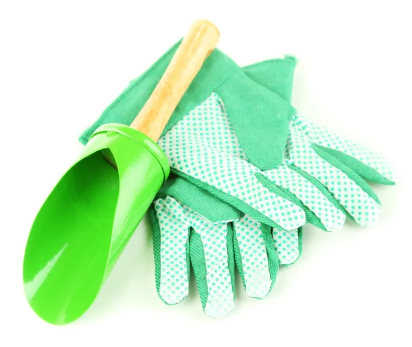 Small gardening shovel and gloves isolated on white — Stock Photo, Image