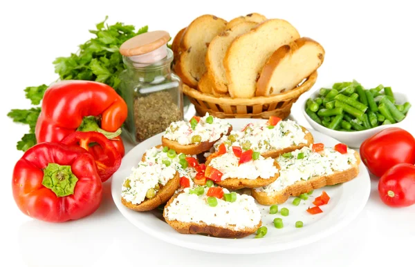 Sandwiches with cottage cheese and greens on plate isolated on white — Stock Photo, Image