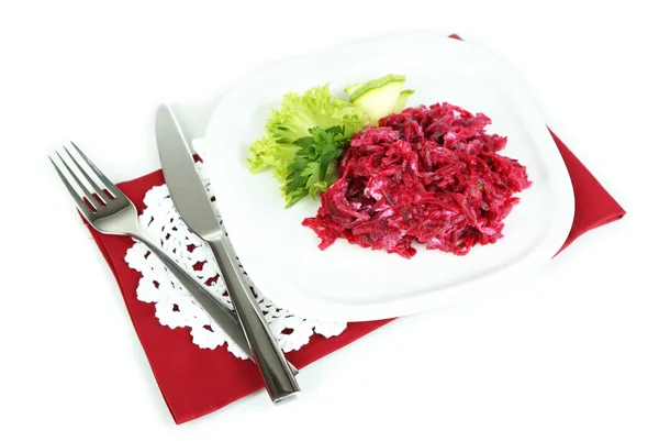 Beet salad on plate on napkins isolated on white — Stock Photo, Image