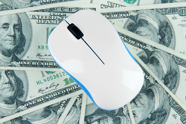 Computer mouse on dollars close up — Stock Photo, Image