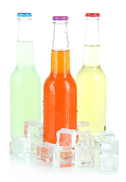 Drinks in glass bottles isolated on white — Stock Photo, Image