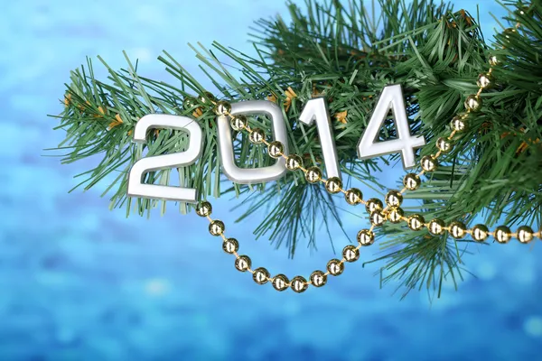 2014 hang on Christmas tree close-up on blue background — Stock Photo, Image