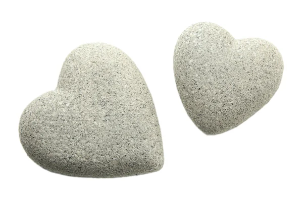 Piedras grises en forma de corazón, aisladas en blanco — Foto de Stock